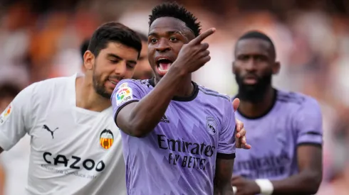 Vinicius Junior of Real Madrid reacts after receiving Racist abuse via gestures made by fans during the LaLiga Santander match between Valencia CF and Real Madrid CF at Estadio Mestalla on May 21, 2023 in Valencia, Spain.
