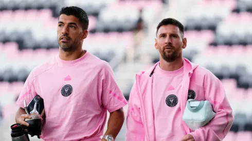 Luis SuĂĄrez #9 and Lionel Messi #10 of Inter Miami CF arrive before a friendly match against Newell's Old Boys at DRV PNK Stadium on February 15, 2024 in Fort Lauderdale, Florida.
