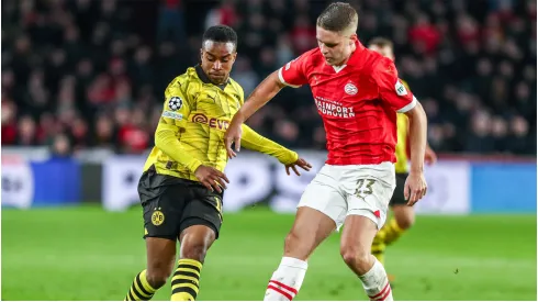 Youssoufa Moukoko of Borussia Dortmund in duel against Joey Veerman of PSV Eindhoven