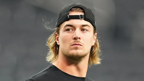 Kenny Pickett looks on before a game.