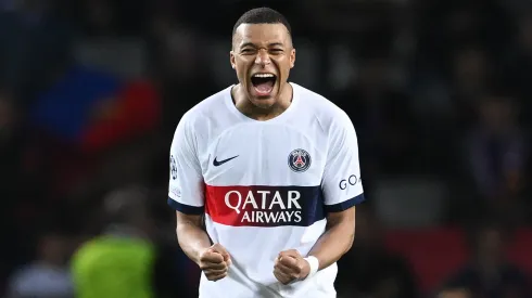 Kylian Mbappe of Paris Saint-Germain celebrates victory in the UEFA Champions League quarter-final second leg match between FC Barcelona and Paris Saint-Germain at Estadi Olimpic Lluis Companys on April 16, 2024 in Barcelona, Spain.