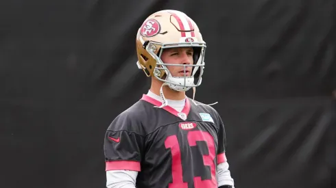 Brock Purdy #13 looks on during San Francisco 49ers practice ahead of Super Bowl LVIII at Fertitta Football Complex on February 09, 2024 in Las Vegas, Nevada.