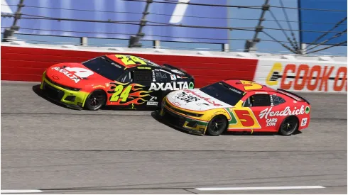 Kyle Larson and William Byron race side by side