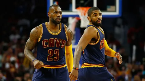 Kyrie Irving #2 of the Cleveland Cavaliers celebrates a fourth quarter basket with LeBron James #23 in game four of the NBA Eastern Conference quarterfinals during the 2016 NBA Playoffs at the Palace of Auburn Hills on April 24, 2016 in Auburn Hills, Michigan. Cleveland won the game 100-98 to win the series.