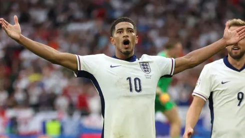 Jude Bellingham of England celebrates scoring his team's first goal during the UEFA EURO 2024 round of 16 match between England and Slovakia at Arena AufSchalke on June 30, 2024 in Gelsenkirchen, Germany