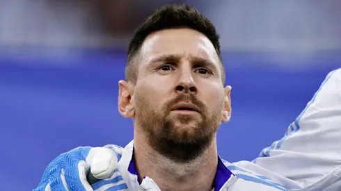 Lionel Messi of Argentina lines up for the national anthem prior to the CONMEBOL Copa America 2024 quarter-final match between Argentina and Ecuador at NRG Stadium on July 04, 2024 in Houston, Texas.