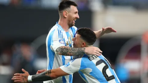 Lionel Messi of Argentina celebrates with teammate Enzo Fernandez after scoring the team's second goal during the CONMEBOL Copa America 2024 semifinal match between Canada and Argentina at MetLife Stadium