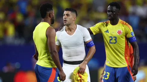 Miguel Borja confronts Luis Suarez of Uruguay after the CONMEBOL Copa America 2024 semifinal match between Uruguay and Colombia.