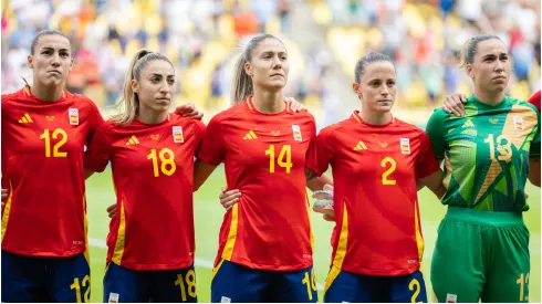 Players of Spain are seen during the national anthem