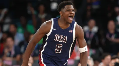 Anthony Edwards #5 of Team United States reacts after a dunk during the Men's Gold Medal game between Team France and Team United States