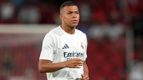 Kylian Mbappe of Real Madrid looks on during the warm up prior to the La Liga match between RCD Mallorca and Real Madrid