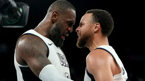 LeBron James #6 and Stephen Curry #4 of Team United States celebrate after their team's win against Team Serbia during a Men's basketball semifinals match between Team United States and Team Serbia.