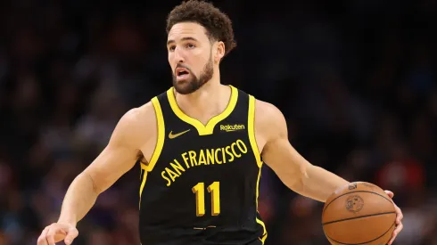 Klay Thompson #11 of the Golden State Warriors handles the ball during the second half of the NBA game