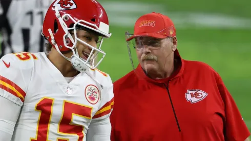 Quarterback Patrick Mahomes #15 of the Kansas City Chiefs talks with head coach Andy Reid before the NFL game against the Las Vegas Raiders at Allegiant Stadium on November 22, 2020 in Las Vegas, Nevada. The Chiefs defeated the Raiders 35-31.