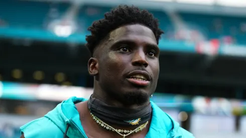 Tyreek Hill #10 of the Miami Dolphins looks on prior to a preseason game against the Atlanta Falcons at Hard Rock Stadium on August 09, 2024 in Miami Gardens, Florida.