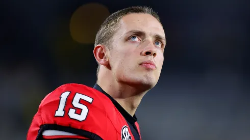 Carson Beck #15 of the Georgia Bulldogs warms up prior to the game against the Georgia Tech Yellow Jackets at Bobby Dodd Stadium on November 25, 2023 in Atlanta, Georgia.