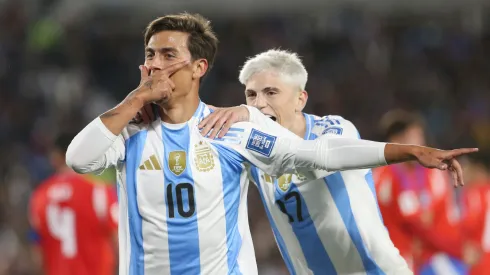 Paulo Dybala of Argentina celebrates after scoring the team's third goal with teammate Alejandro Garnacho during the FIFA World Cup 2026 Qualifier match between Argentina and Chile at Estadio Más Monumental Antonio Vespucio Liberti on September 05, 2024 in Buenos Aires, Argentina.