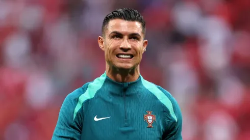 Cristiano Ronaldo of Portugal looks on as he warms up prior to the UEFA EURO 2024 group stage match between Portugal and Czechia at Football Stadium Leipzig on June 18, 2024 in Leipzig, Germany.