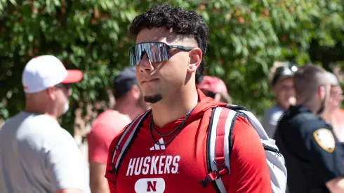 Dylan Raiola #15 of the Nebraska Cornhuskers leads the team to the stadium before the game against the UTEP Miners at Memorial Stadium on August 31, 2024 in Lincoln, Nebraska.