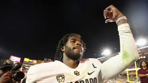 Quarterback Shedeur Sanders #2 of the Colorado Buffaloes celebrates as he walks off the field following the NCAAF game against the Arizona State Sun Devils at Mountain America Stadium on October 07, 2023 in Tempe, Arizona. The Buffaloes defeated the Sun Devils 27-24.