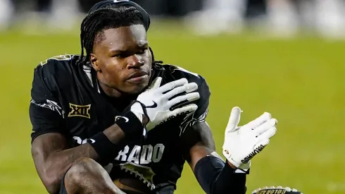 Colorado Buffaloes wide receiver Travis Hunter points first down after having his helmet ripped off after a catch in the second half of the football game between Colorado and North Dakota State in Boulder, CO.