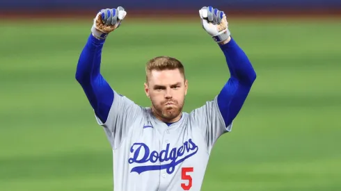 Freddie Freeman #5 of the Los Angeles Dodgers celebrates after hitting a double against the Miami Marlins during the fifth inning of the game at loanDepot park on September 18, 2024 in Miami, Florida.