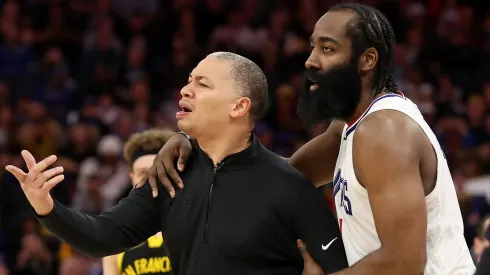 James Harden #1 holds back LA Clippers head coach Tyronn Lue during their game against the Golden State Warriors at Chase Center on February 14, 2024 in San Francisco, California.