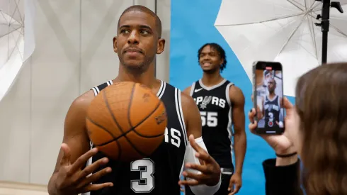 Chris Paul #3 of the San Antonio Spurs poses for a video as Harrison Ingram #55 is photographed at the San Antonio Spurs Media Day at the Victory Capital Performance Center on September 30, 2024 in San Antonio, Texas.