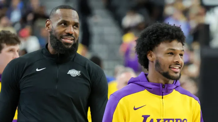 LeBron James (L) #23 and Bronny James #9 of the Los Angeles Lakers warm up before a preseason game against the Golden State Warriors at T-Mobile Arena at T-Mobile Arena on October 15, 2024 in Las Vegas, Nevada.