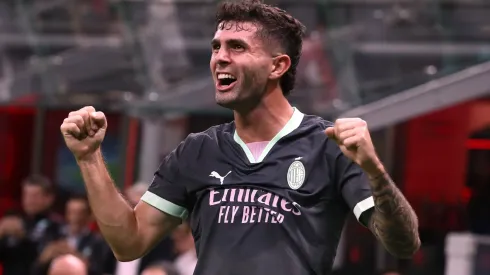 Christian Pulisic of AC Milan celebrates after scoring the opening goal during the UEFA Champions League 2024/25 League Phase MD3 match between AC Milan and Club Brugge KV at Stadio San Siro on October 22, 2024 in Milan, Italy. (Photo by Marco Luzzani/Getty Images)