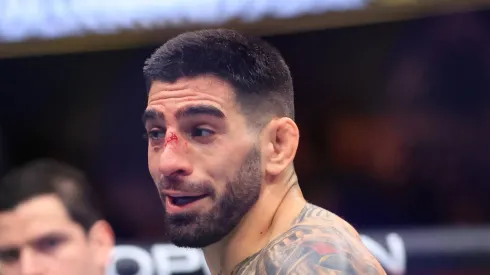 Ilia Topuria reacts to knocking out Alexander Volkanovski of Australia in their featherweight title fight during UFC 298 at Honda Center on February 17, 2024 in Anaheim, California.