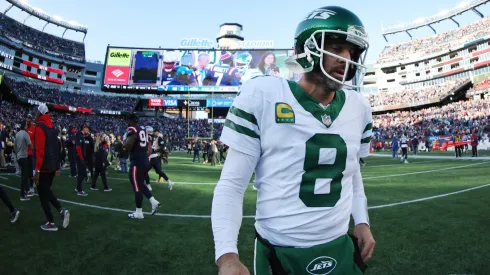 Aaron Rodgers #8 of the New York Jets walks off the field after the game against the New England Patriots at Gillette Stadium on October 27, 2024 in Foxborough, Massachusetts. (Photo by Adam Glanzman/Getty Images)