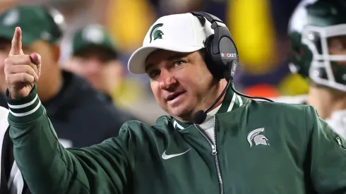 Head coach Jonathan Smith of the Michigan State Spartans reacts during the third quarter against the Michigan Wolverines at Michigan Stadium on October 26, 2024 in Ann Arbor, Michigan.