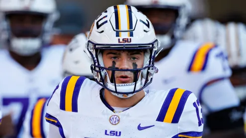 Garrett Nussmeier #13 of the LSU Tigers leads the team onto the field before the game against the Arkansas Razorbacks at Donald W. Reynolds Razorback Stadium on October 19, 2024 in Fayetteville, Arkansas.