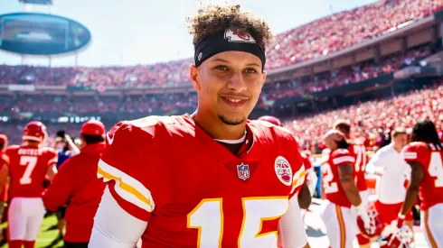 Patrick Mahomes #15 of the Kansas City Chiefs smiles on the sidelines before the start of the game against the San Francisco 49ers at Arrowhead Stadium on September 23rd, 2018.