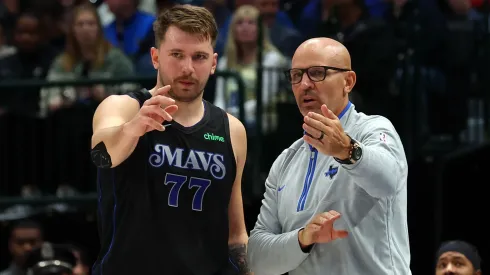 Luka Doncic #77 of the Dallas Mavericks talks with head coach Jason Kidd in the first half of the NBA In-Season Tournament game against the LA Clippers at American Airlines Center on November 10, 2023 in Dallas, Texas.