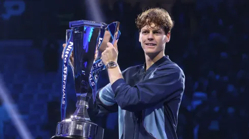Jannik Sinner of Italy poses for a photo with the ATP Finals trophy after his victory against Taylor Fritz of United States