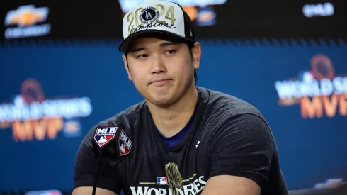 Shohei Ohtani #17 of the Los Angeles Dodgers talks to the media after the Dodgers defeated the New York Yankees 7-6 in game 5 to win the 2024 World Series at Yankee Stadium on October 30, 2024 in the Bronx borough of New York City.