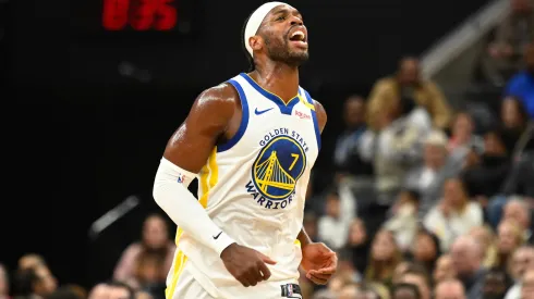 Buddy Hield #7 of the Golden State Warriors reacts to a play during the first half of a game against the Utah Jazz at Delta Center