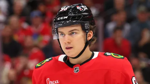 Connor Bedard #98 of the Chicago Blackhawks reacts against the Detroit Red Wings during the second period at the United Center on November 06, 2024 in Chicago, Illinois.