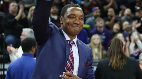 Former Detroit Pistons guard Isiah Thomas waves to fans during a tribute during first-half break in the action against the Los Angeles Lakers.