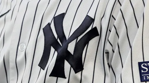 The logo of the New York Yankees on the uniform of first base coach Travis Chapman (#75) during a game against the Kansas City Royals at Yankee Stadium on July 21, 2023, in the Bronx borough of New York City.