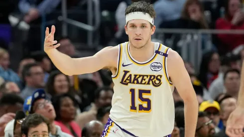 Austin Reaves #15 of the Los Angeles Lakers reacts after making a three-point shot against the Golden State Warriors during the second half at Chase Center on December 25, 2024 in San Francisco, California.