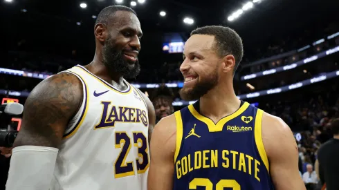 LeBron James #23 of the Los Angeles Lakers and Stephen Curry #30 of the Golden State Warriors talk to each other after the Lakers beat the Warriors