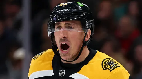 Brad Marchand #63 of the Boston Bruins disputes a call during the first period of the game against the Buffalo Sabres at TD Garden on December 21, 2024 in Boston, Massachusetts.