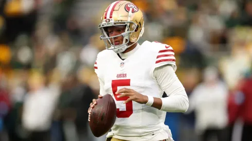 Joshua Dobbs #5 of the San Francisco 49ers participates in warmups prior to a game against the Green Bay Packers at Lambeau Field on November 24, 2024.
