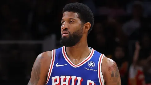 Paul George #8 of the Philadelphia 76ers brings the ball up the court against the Atlanta Hawks during the second quarter at State Farm Arena on October 14, 2024 in Atlanta, Georgia.