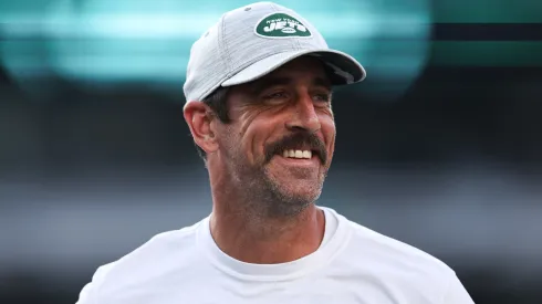 Aaron Rodgers #8 of the New York Jets warms up before the preseason game against the Tampa Bay Buccaneers at MetLife Stadium on August 19, 2023 in East Rutherford, New Jersey.