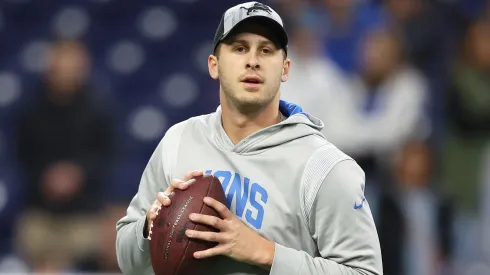 Jared Goff #16 of the Detroit Lions warms-up prior to a game against the Denver Broncos at Ford Field on December 16, 2023 in Detroit, Michigan.