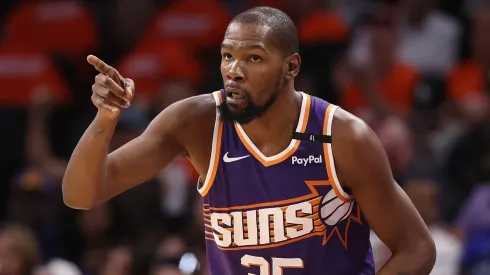 Kevin Durant #35 of the Phoenix Suns reacts to a three-point shot during the NBA game at Footprint Center on October 26, 2024 in Phoenix, Arizona. The Suns defeated the Mavericks 114-102.